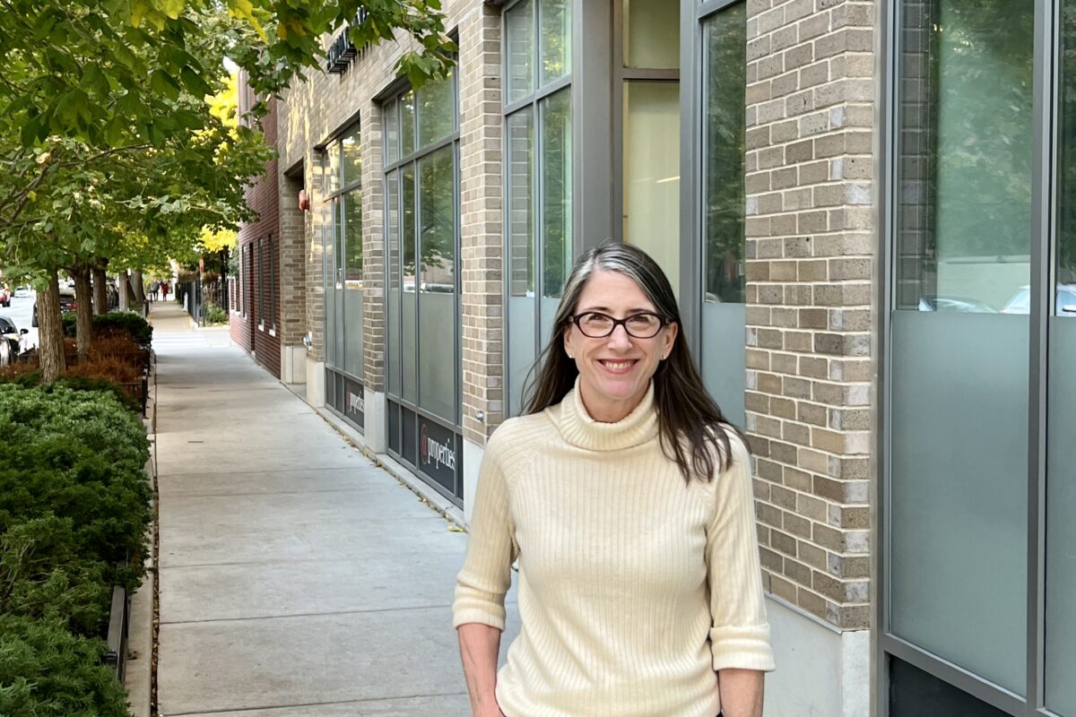 maureen moran on the sidewalk in front of her office