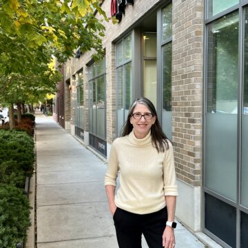 maureen moran on the sidewalk in front of her office