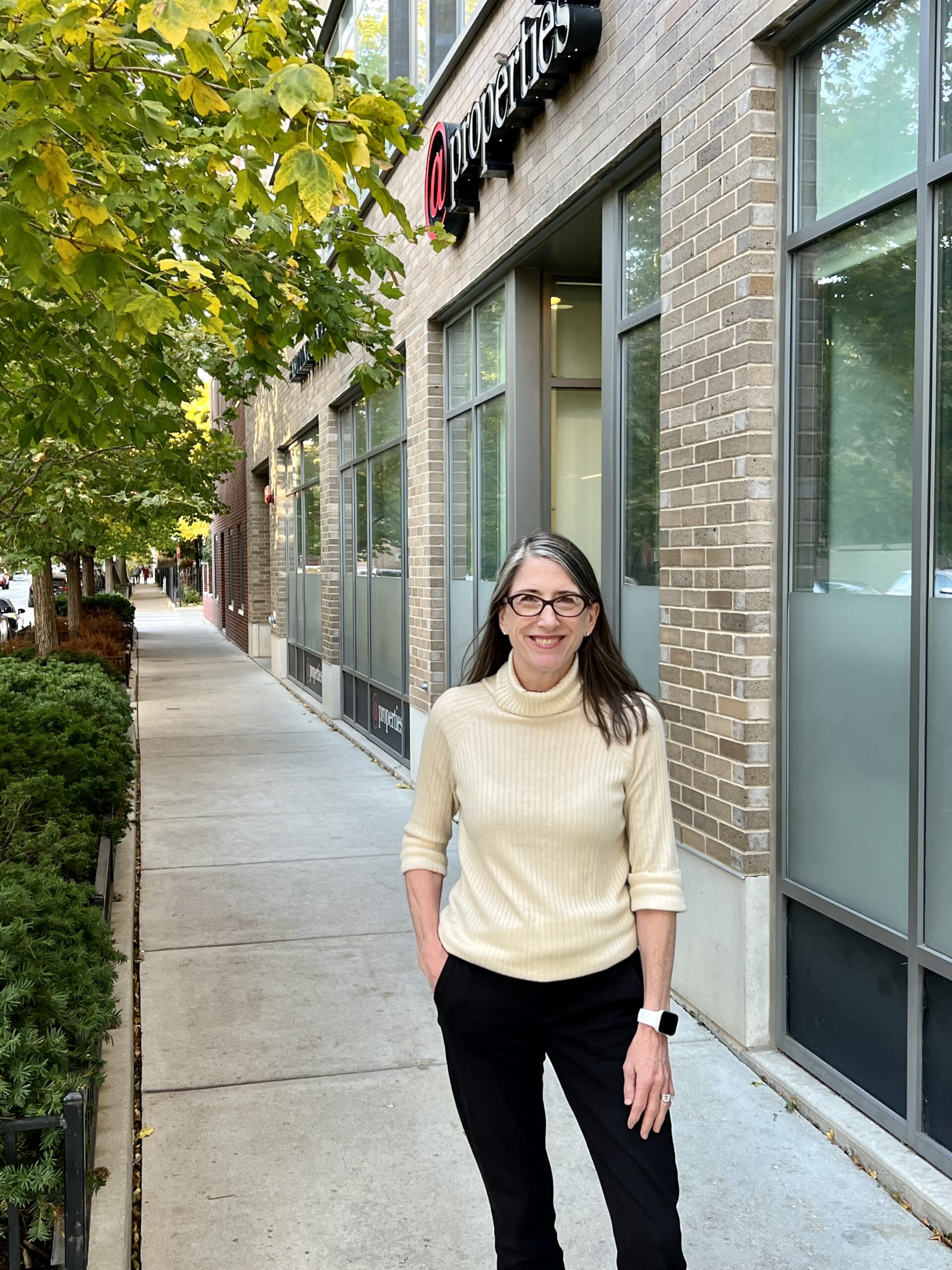 maureen moran on the sidewalk in front of her office